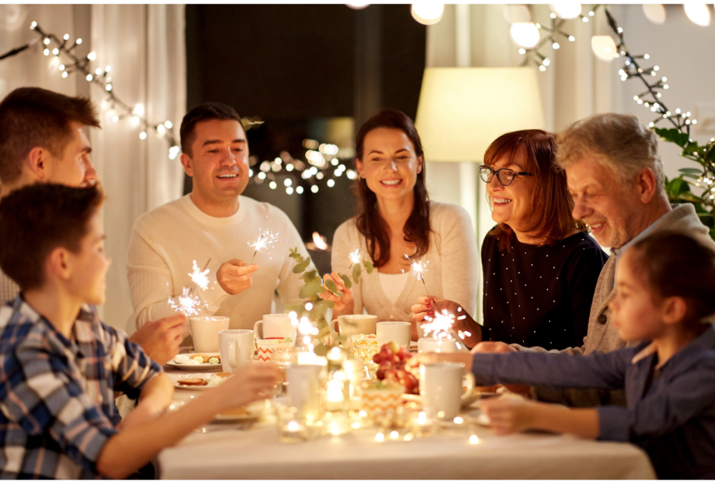 Family celebrating Christmas around the dinner table